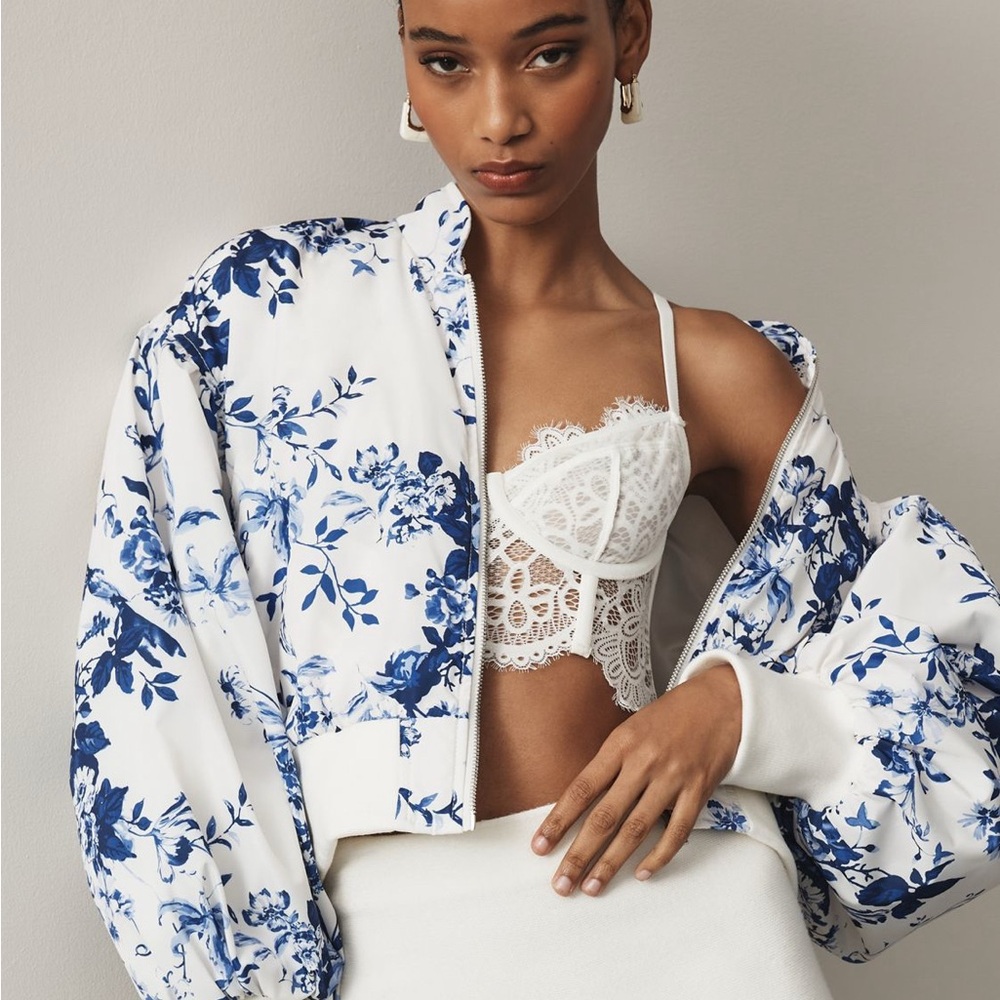 By Anthropologie Cropped Floral Blue and White Bomber Jacket